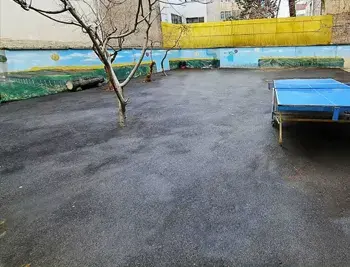 مدرسه علامه طباطبایی واحد یوسف آباد، تصویری از حیاط مدرسه دخترانه علامه طباطبایی یوسف آباد در فصل پاییز